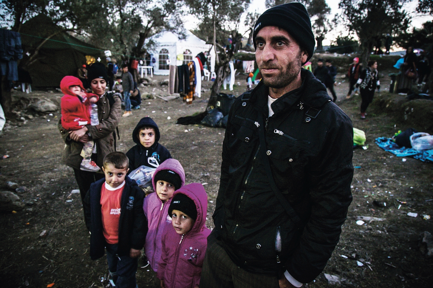 Rodzina, której udało się dotrzeć drogą morską na wyspę Lesbos, Grecja, fot. Nicola Zolin 